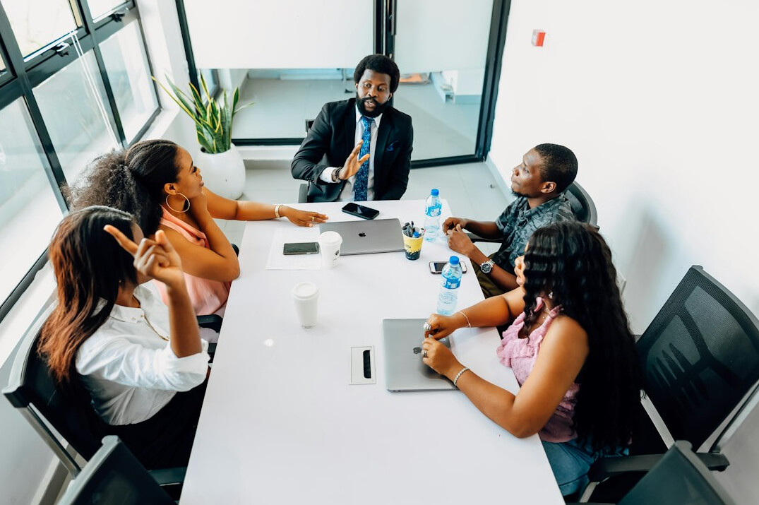 team meeting about insurance tech