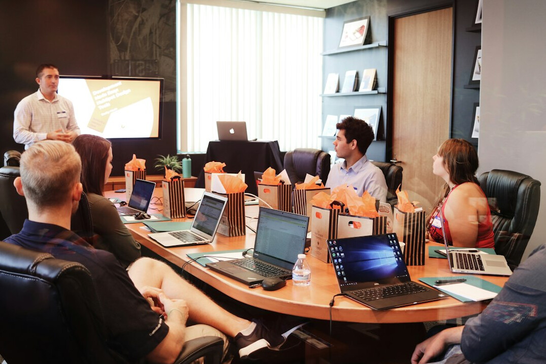 team meeting insurance tech